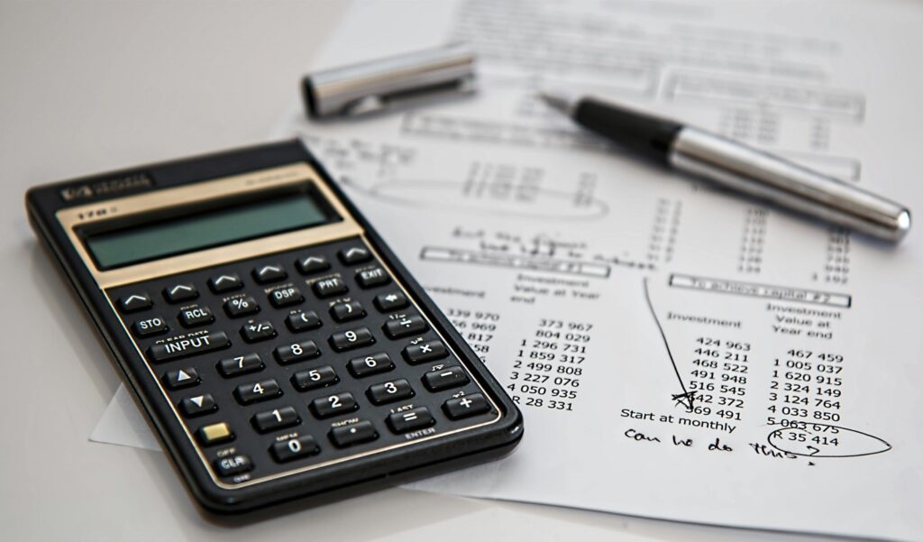 Pen Calculator and Financial Statement